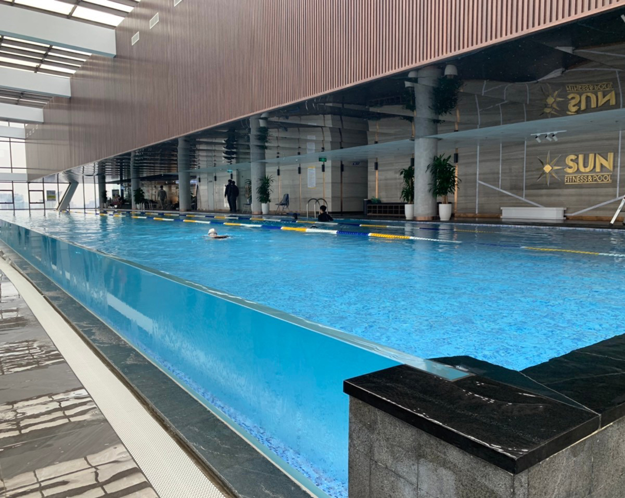 Completed 48.24 m continuous transparent pool wall at a public gym in Vietnam